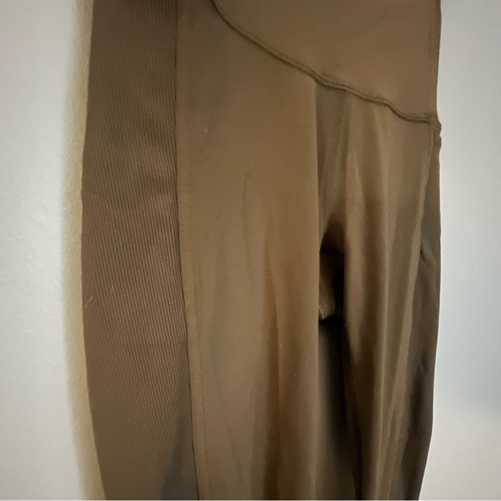 Lululemon army green side pocket ribbed detail - super cute!!  Size 4
